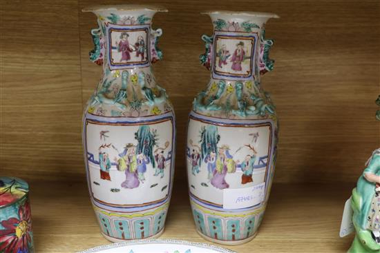 A Chinese crackle glaze bowl and jar, a pair of famille rose vases and two stone china plates